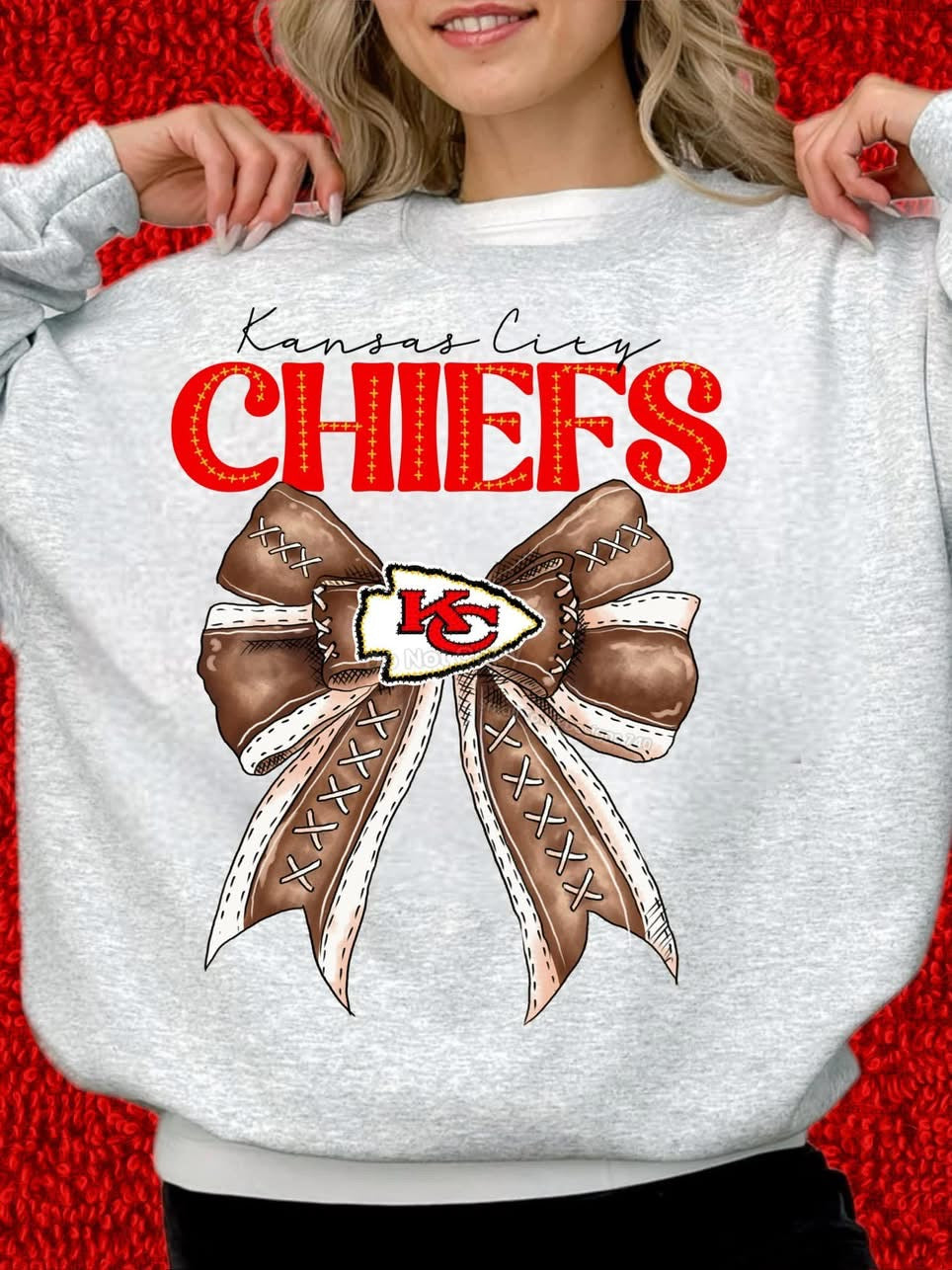 Chiefs with cute football bow