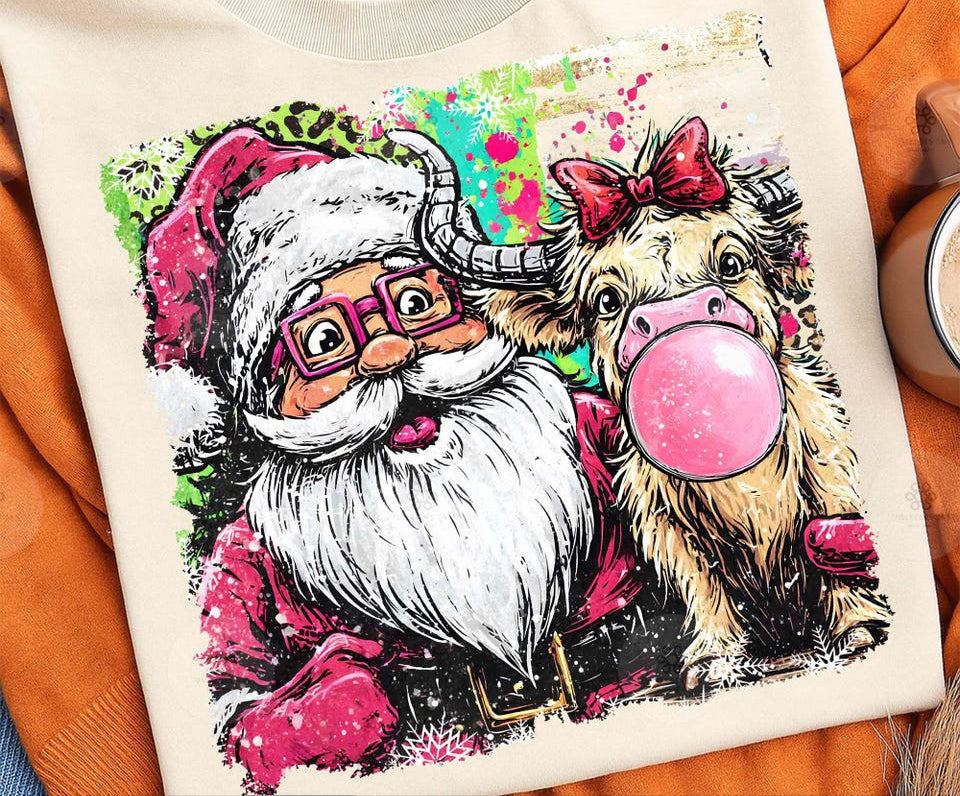 The cutest Santa with highland cow
