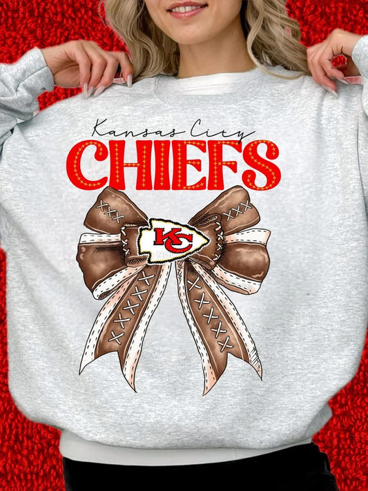 Chiefs with cute football bow