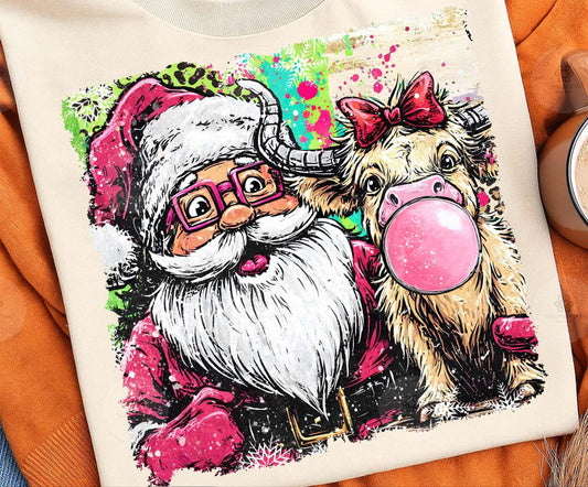The cutest Santa with highland cow